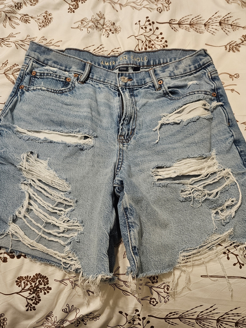 American Eagle Outfitters Faded Light Blue Ripped Denim Shorts